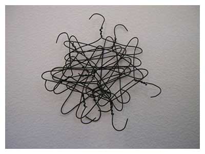 lisa solomon art - pile of small hangers