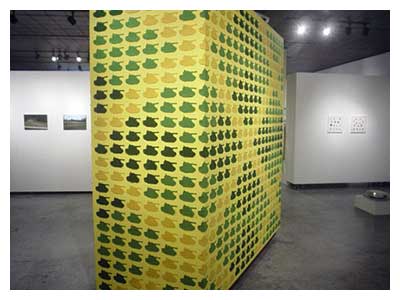 lisa solomon art - synchronized tanks -green and yellow tanks installed at Women and their Work, Austin